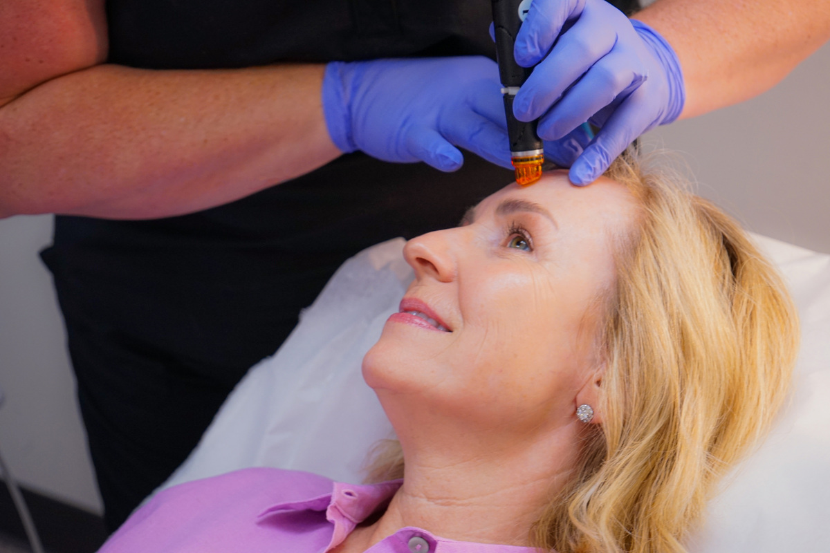 patient getting hydrafacial treatment